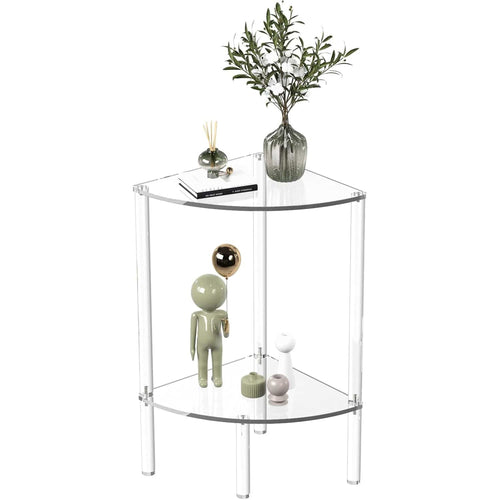 2-tier clear acrylic corner side table styled with a vase of flowers, reed diffuser, and decorative figurines