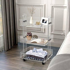 3-tier clear acrylic rolling cart used as a bedroom organizer for clothes, decor, and books