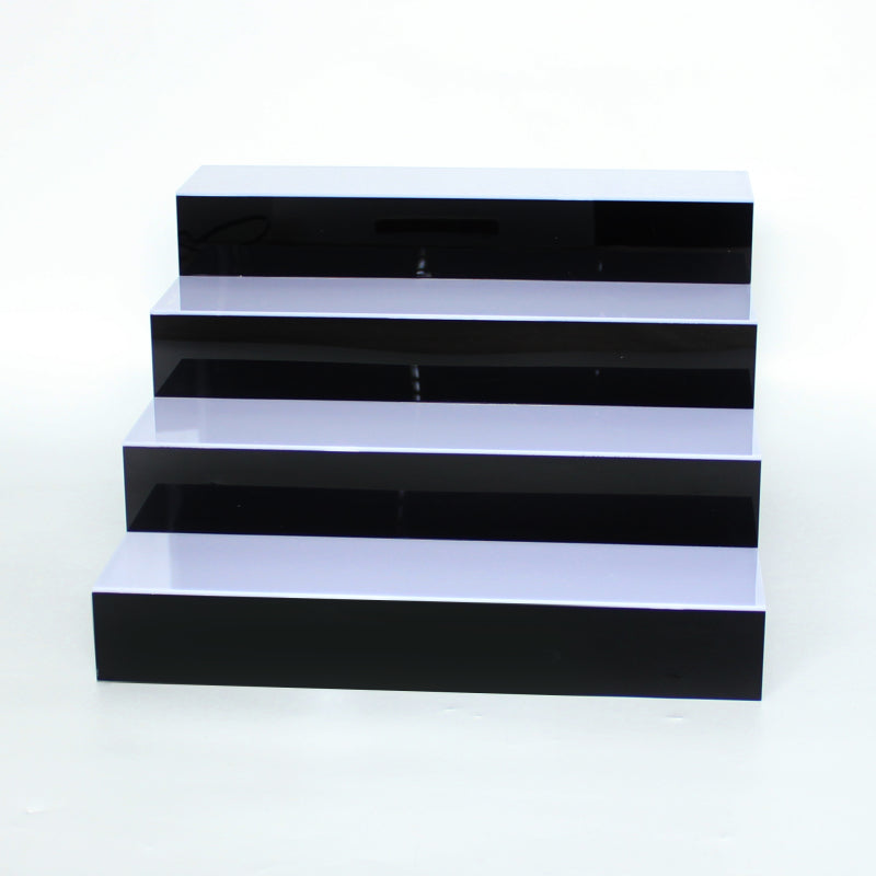 4 tier black acrylic stepped display stand, tiered riser for collectibles, cosmetics and retail products, non-LED