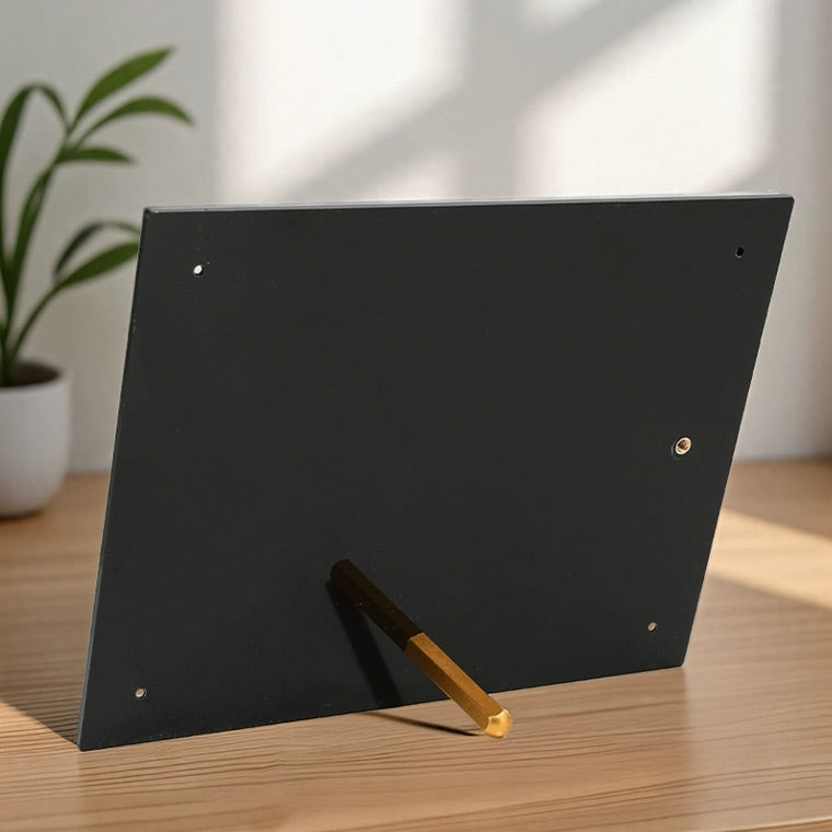 Back view of an acrylic certificate frame, showing the built-in golden stand that enables stable tabletop display in both horizontal and vertical orientations