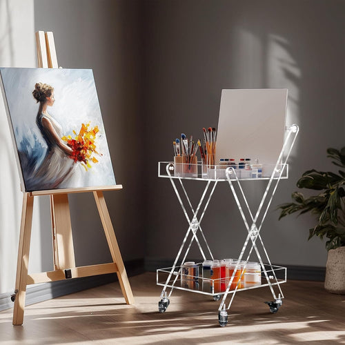 Clear acrylic cart used as an art supply storage cart in an artist's studio