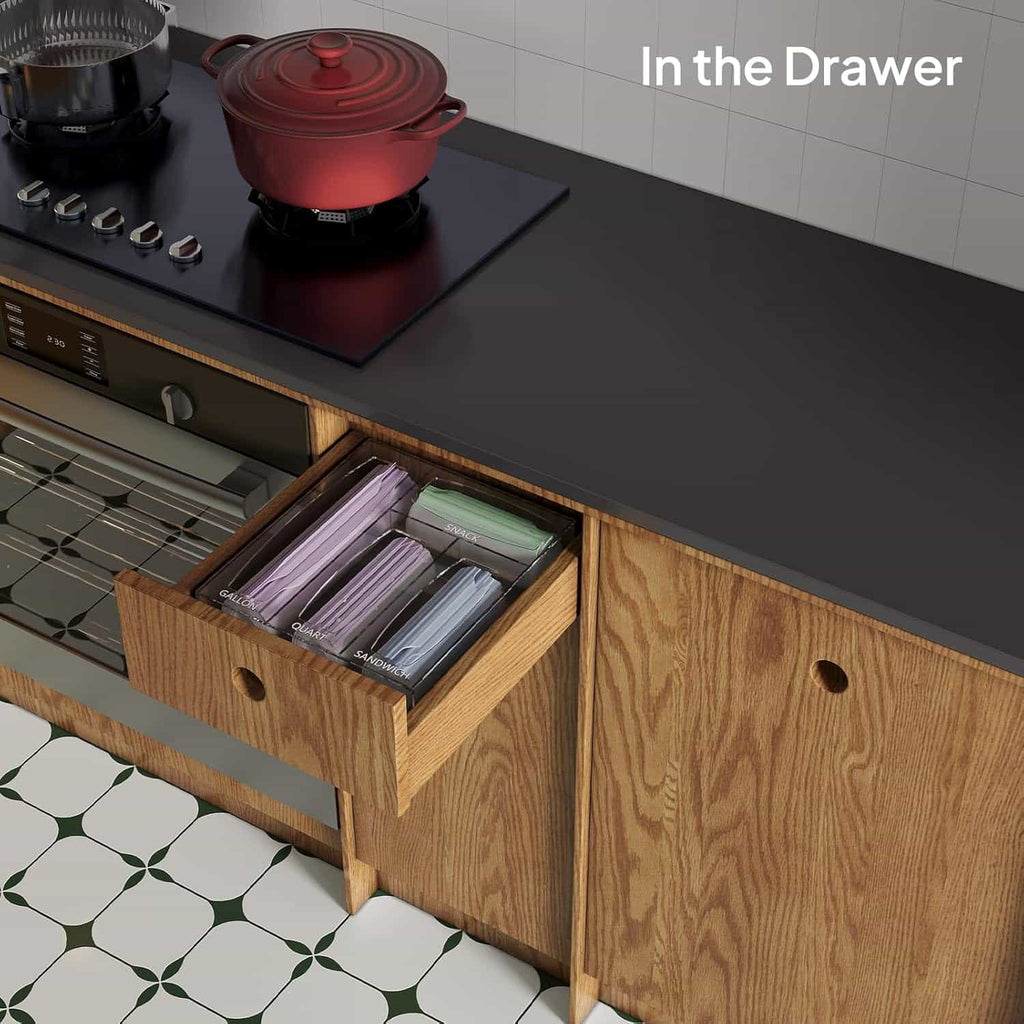 Clear acrylic bag organizer installed in a kitchen drawer for neat storage