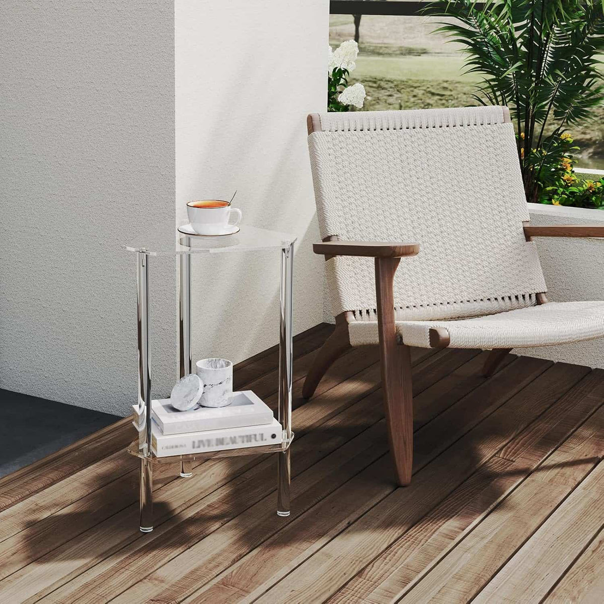2-tier acrylic corner side table next to a modern lounge chair, holding a coffee cup and books