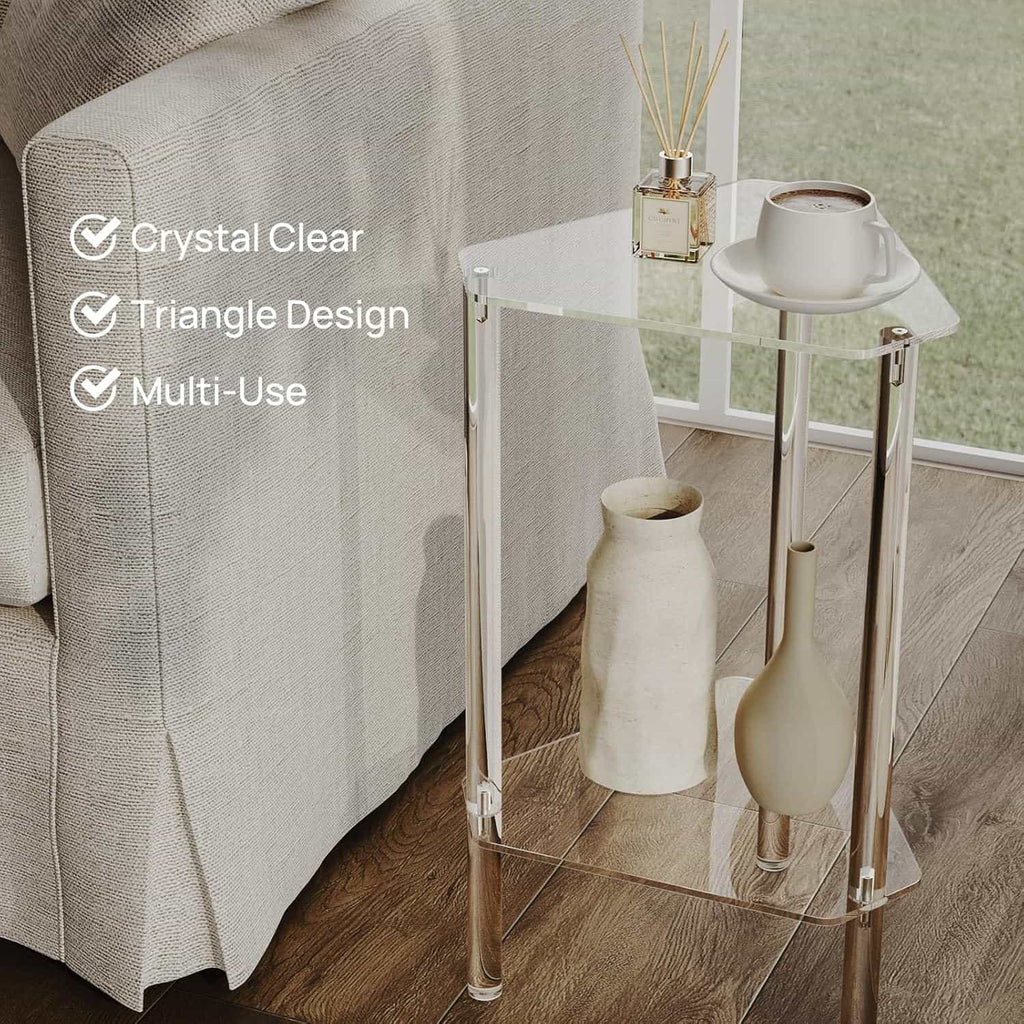 2-tier acrylic corner side table by a sofa, showcasing its crystal clear, triangular design