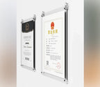 Wall-mounted acrylic holders displaying certificate and business license, secured with metal clips