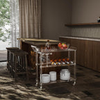 Acrylic serving cart in a modern kitchen, used to store tableware and drinks for easy entertaining