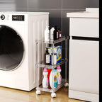 Slim acrylic rolling cart in a laundry room, storing cleaning supplies next to a washing machine