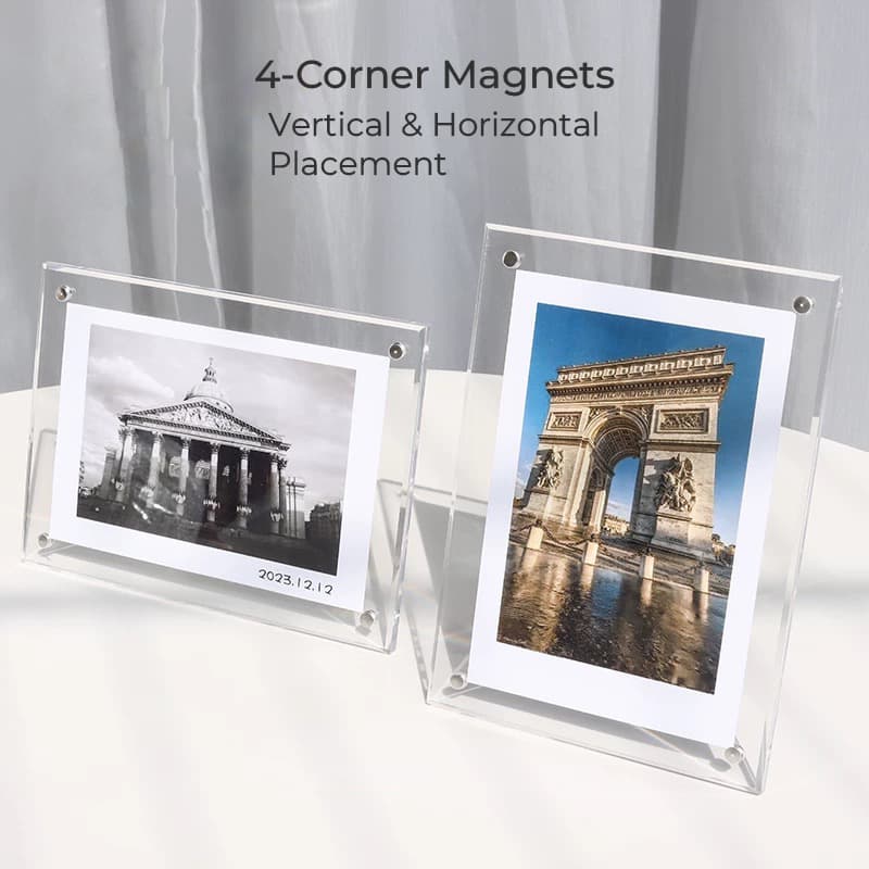 Two clear acrylic magnetic photo frames displaying travel photos of landmarks