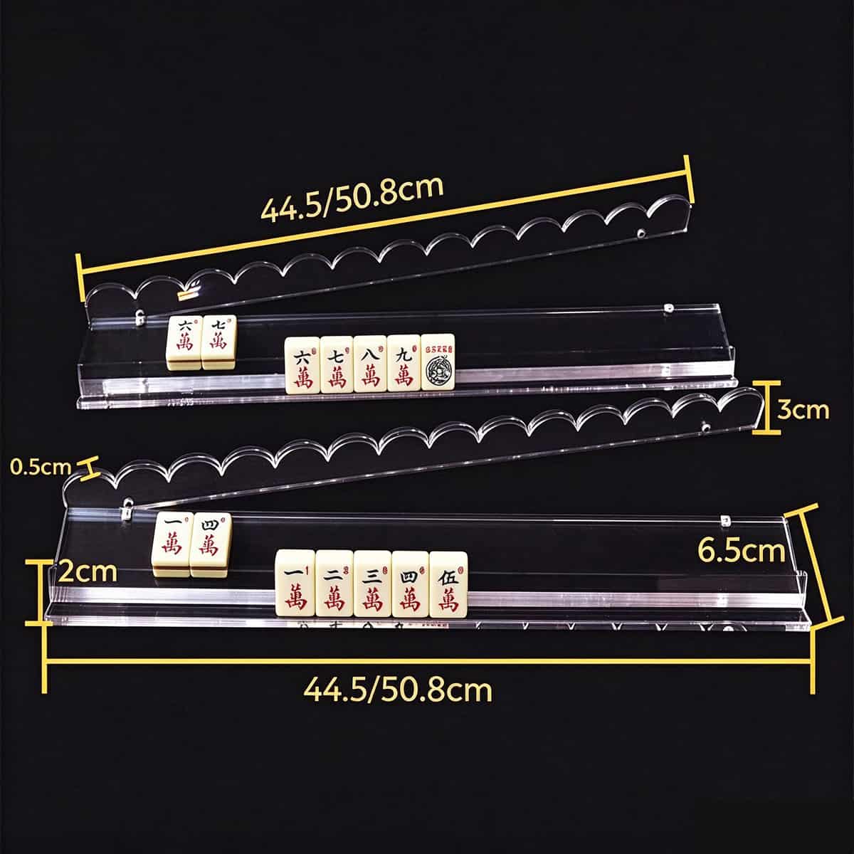 Dimension diagram of clear scalloped acrylic mahjong rack with magnetic tile pusher, size markings on black background, for American mahjong