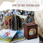Acrylic photo box next to an expanded photo album, showing its capacity for storing multiple photos or cards