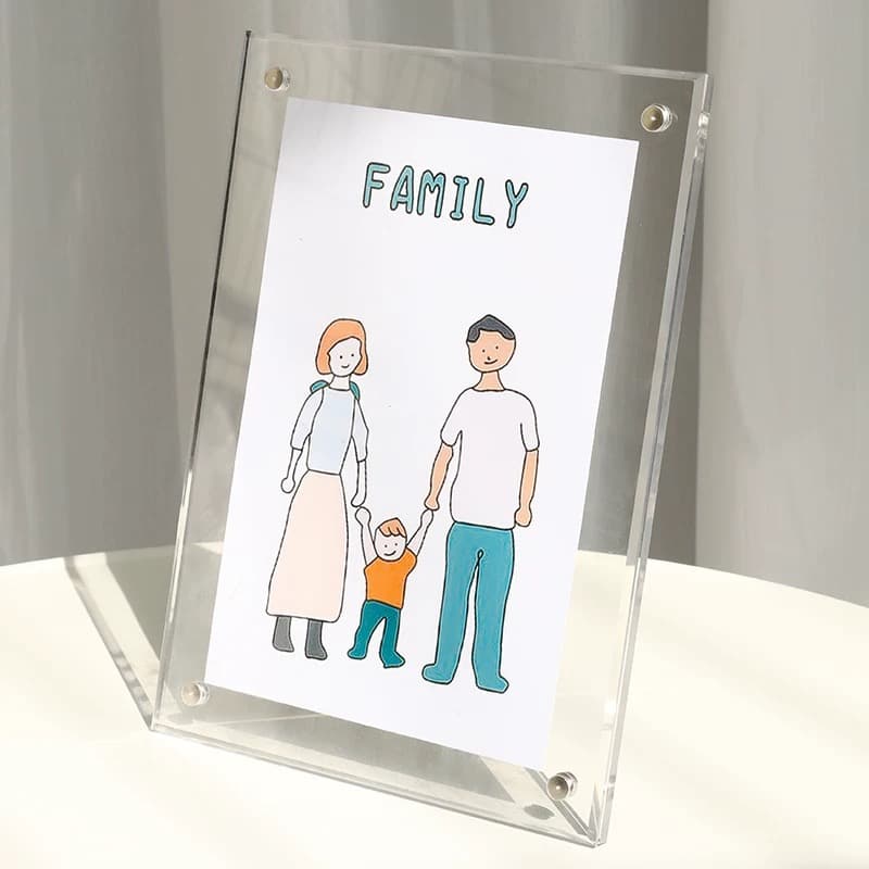 Clear acrylic magnetic photo frame (tabletop) displaying a hand-drawn "FAMILY" illustration