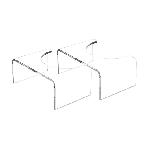 Clear acrylic step stool in a festive Christmas setting with a tree and gift boxes