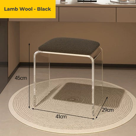Clear acrylic vanity stool with black lamb wool cushion, perfect for minimalist decor
