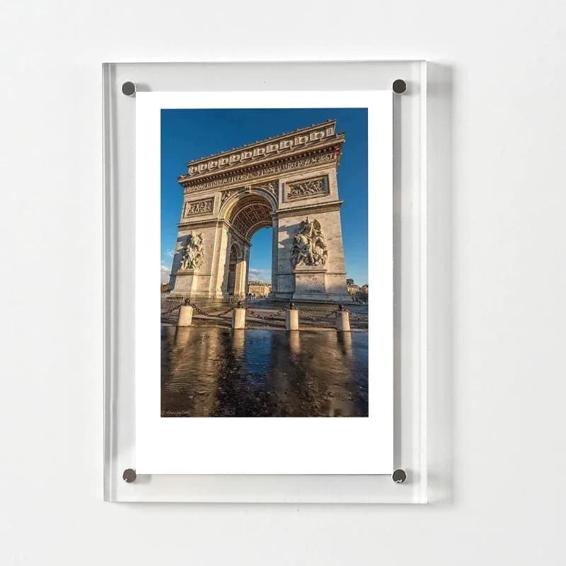 Clear acrylic magnetic photo frame (wall-mounted) displaying a travel photo of the Arc de Triomphe