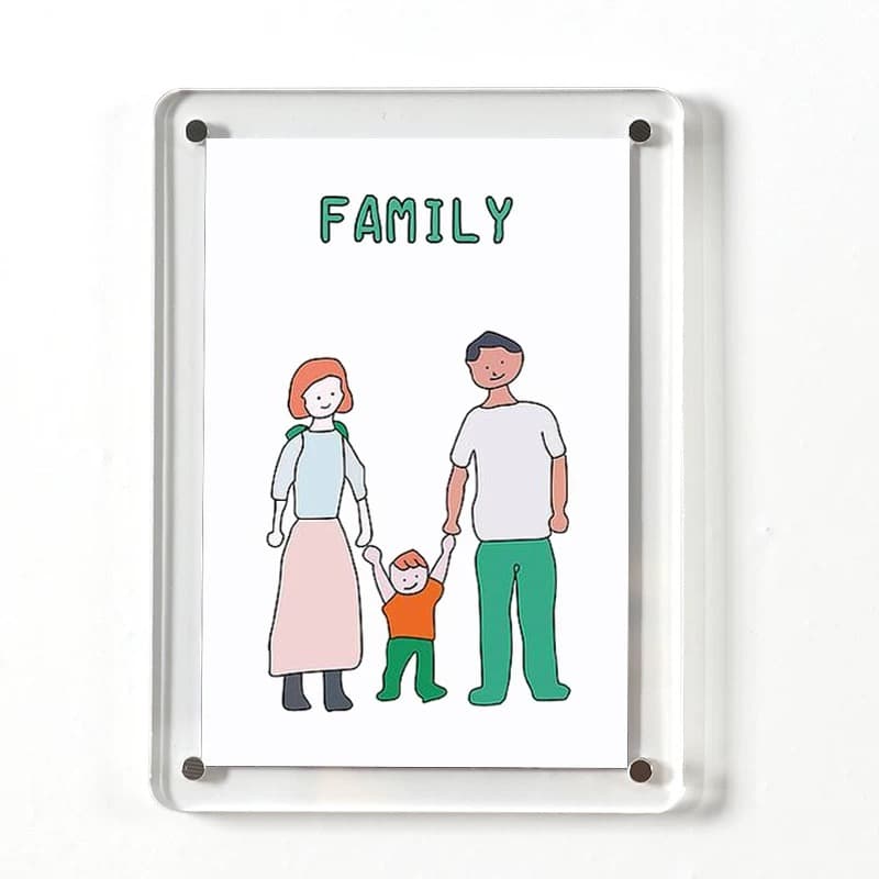 Wall-mounted clear acrylic magnetic photo frame with a hand-drawn "FAMILY" illustration