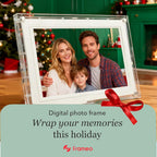 Frameo acrylic digital photo frame decorated with a red ribbon, displayed as a holiday gift for family memories