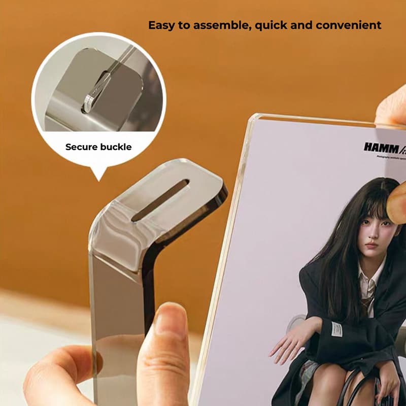 Easy-to-assemble acrylic photo frame: hand inserting photo into frame, secure buckle design for stable fixation
