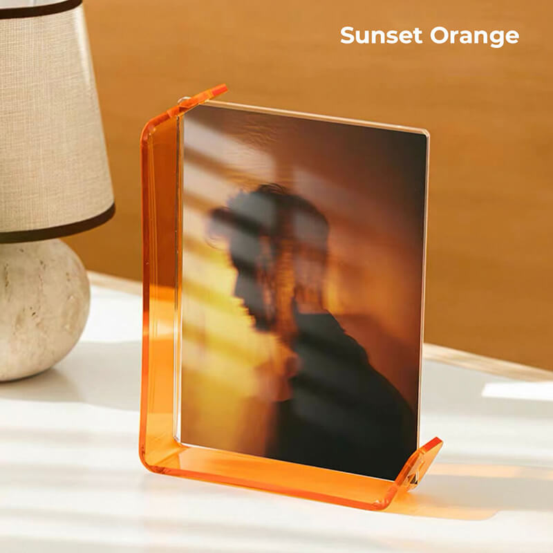 7-inch Sunset Orange acrylic photo frame, displaying portrait photo with orange border accent