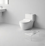 Child using clear acrylic step stool to reach a bathroom sink, safe and sturdy for kids and adults