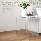 Modern clear acrylic end table with a U-shaped waterfall design, styled with a vase of white roses and books