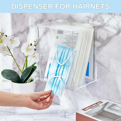 Wall-mounted clear acrylic dispenser holding face masks, with a hand grabbing a mask for easy access